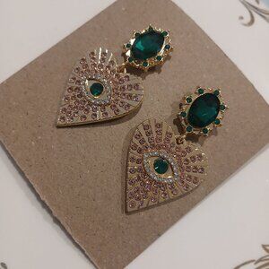 174- Pink and green gold tone heart halloween evil eye earrings